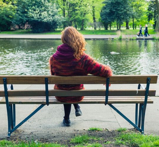 services-individual-internal-2 Woman sitting on bench